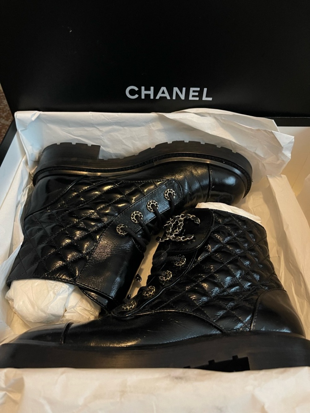CHANEL Black Quilted Leather Lace-Up Boots with Chain Detail